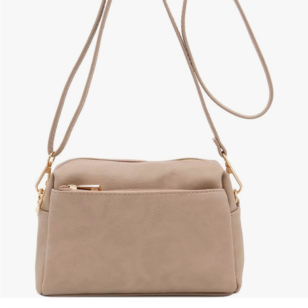 NWT light pink small cross body bag.